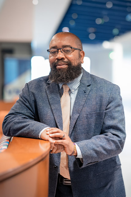 Dr. Faison standing for a profile picture
